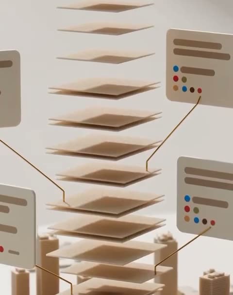 A gold model tower with its floors lifted apart, each floor tagged with its units